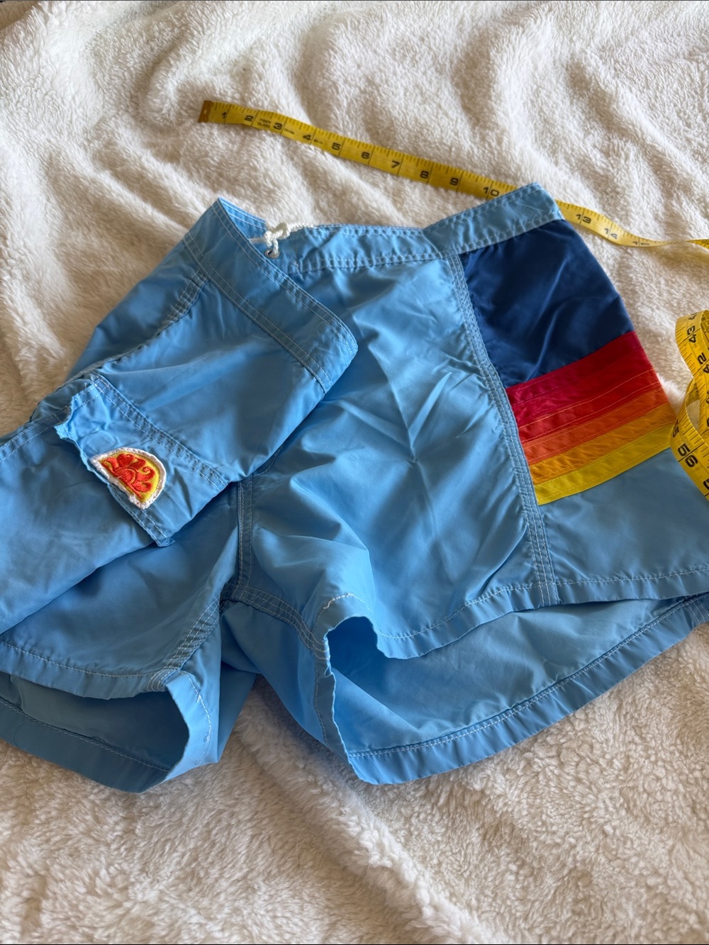 Retro Light Blue Swim Shorts with Rainbow Stripe